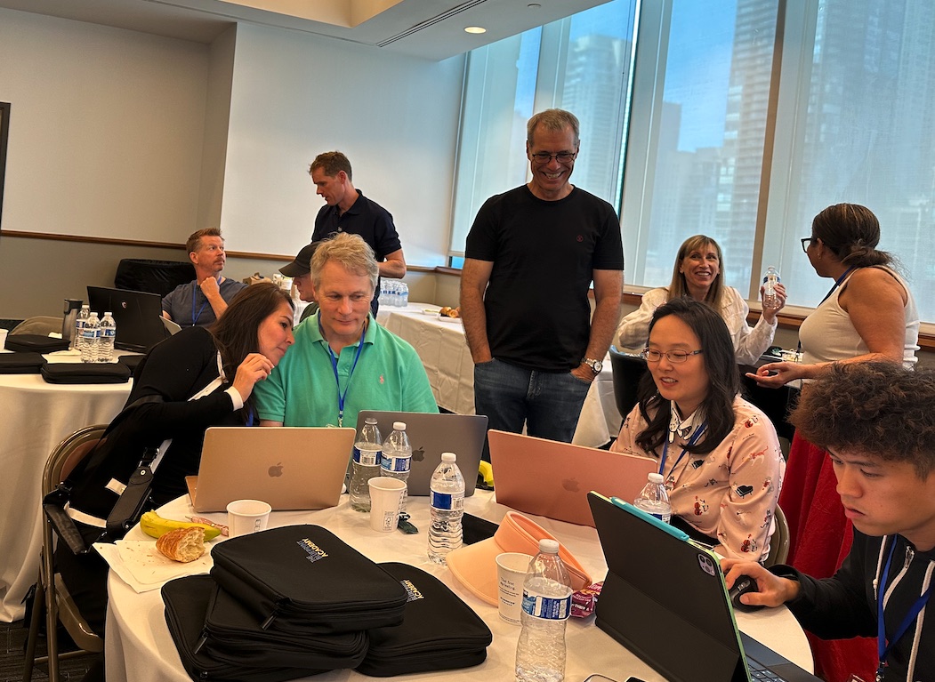 Aidan Booth helping attendees at a live event